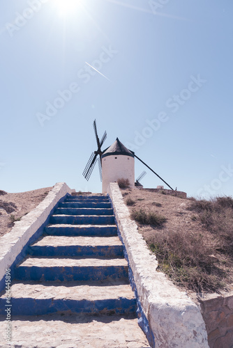 Isolated Don Quixote's windmill of Consuegra from below with blue stairs in Toledo. Representative picture in the area of 