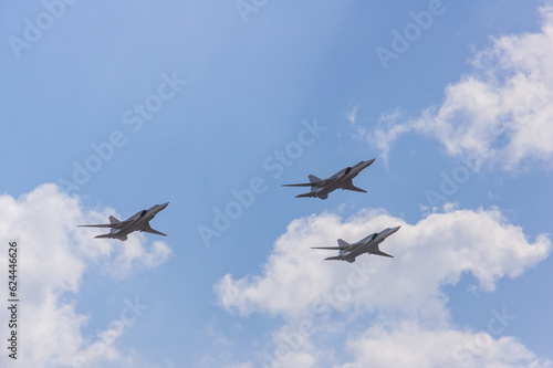 Long-range supersonic bombers-missile carriers in the sky. Three Tu-22M3 aircraft (NATO - Backfire) perform demonstration flight. 100 years of Russian Air Force. Zhukovsky, Russia, August 12, 2012