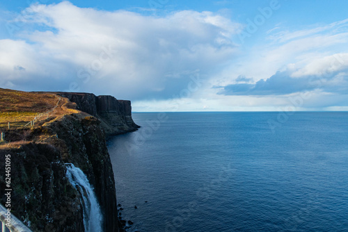 Sea view from the cliffs with water fall. Isle of Skye.