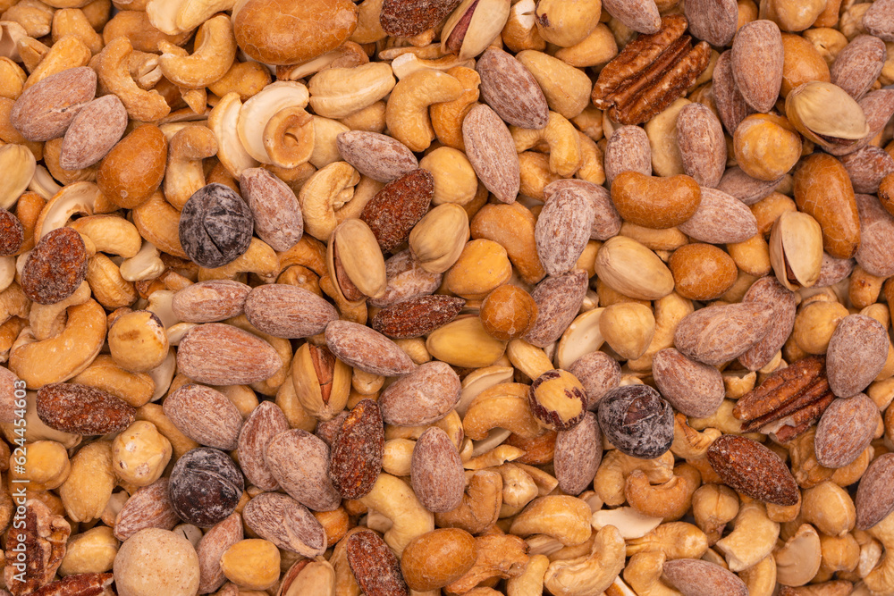 A group of almonds, pistachios, walnuts, macadamia, cashews. A group of almonds, pistachios, walnuts, macadamia, cashews.
