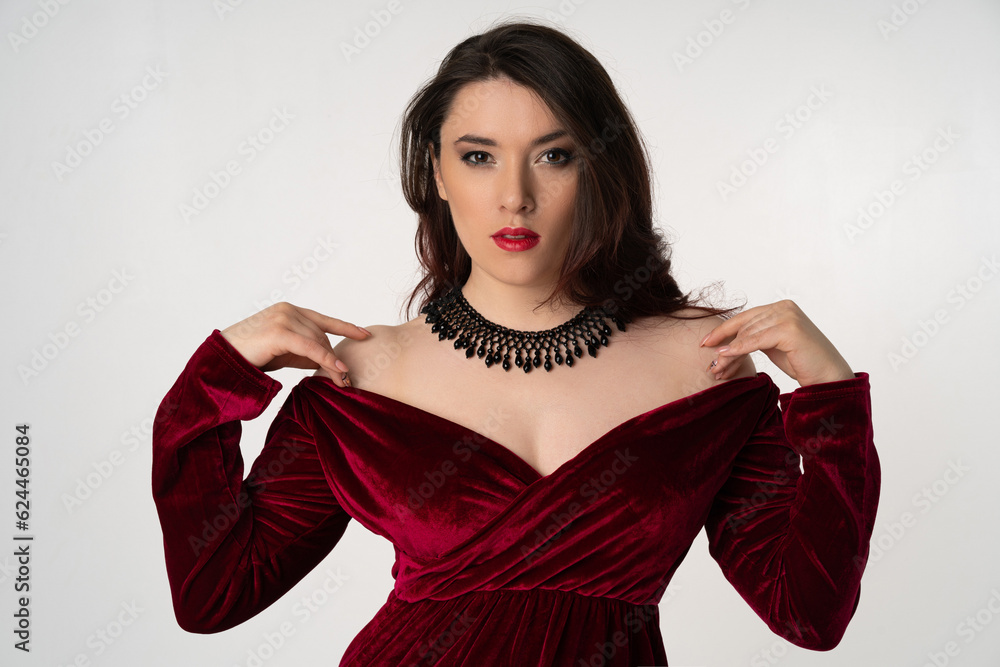 elegant luxury woman in evening dress posing on white background elegant luxury woman in evening dress posing on white background