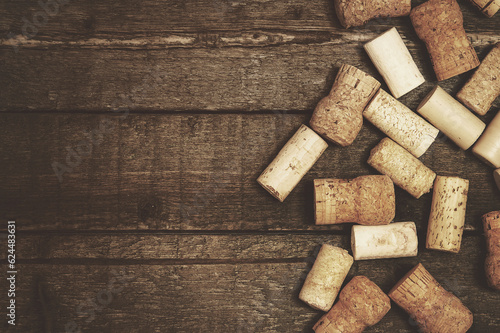 Heap of vintage wine corks on wooden table