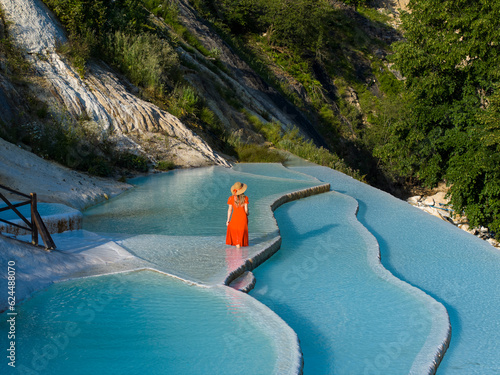 Woman in Red Dress on the Turquoise Travertines Drone Photo, Göksu Travertines Dereli, Giresun Turkey (Turkiye) photo