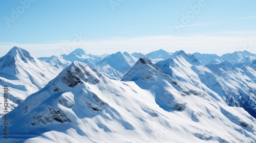 Snow-capped mountains against a clear sky
