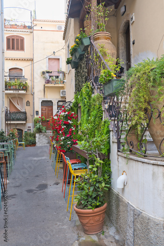 Taormina, Italy, Sicily, old town, bars, alleys, old facades, stairs with a Mediterranean flair © Vincenzo