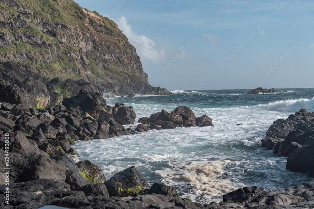 The sea meeting the volcanic rocks on the island of Sao Miguel in the Azores. 