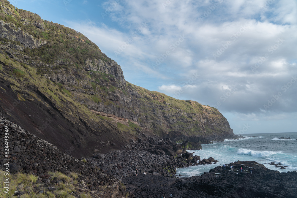 The sea meeting the volcanic rocks on the island of Sao Miguel in the Azores. The sea meeting the volcanic rocks on the island of Sao Miguel in the Azores.