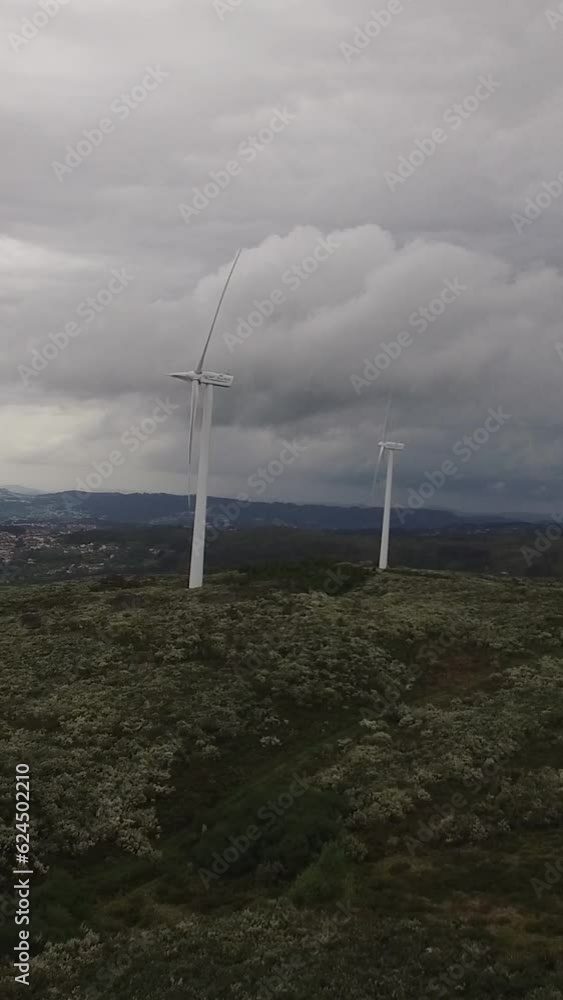 Vertical Video wind turbine in the mountains Vertical Video wind turbine in the mountains