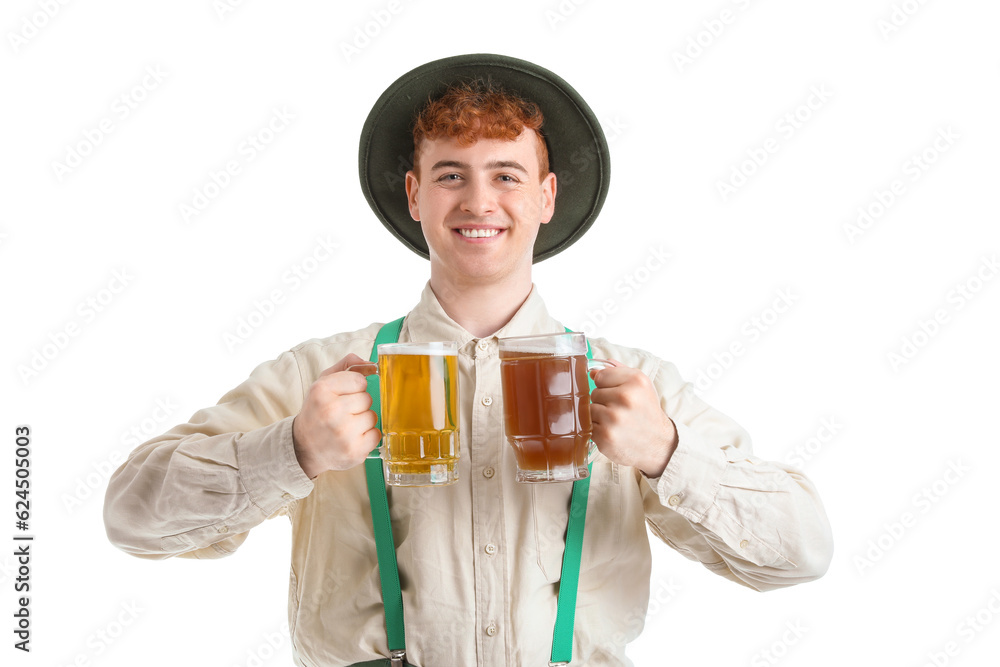 Young man in traditional German clothes with beer on white background Young man in traditional German clothes with beer on white background