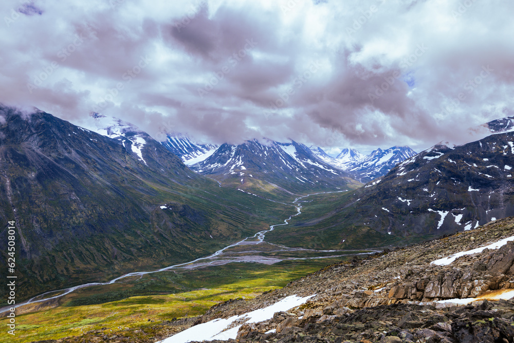 Galdhopiggen, Norway - July 3rd, 2023: The mountain landscape on the hike to the peak of Galdhopiggen In Jotunheimen National Park, Norway Galdhopiggen, Norway - July 3rd, 2023: The mountain landscape on the hike to the peak of Galdhopiggen In Jotunheimen National Park, Norway