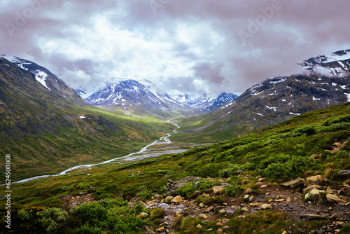 Galdhopiggen, Norway - July 3rd, 2023: The mountain landscape on the hike to the peak of Galdhopiggen In Jotunheimen National Park, Norway