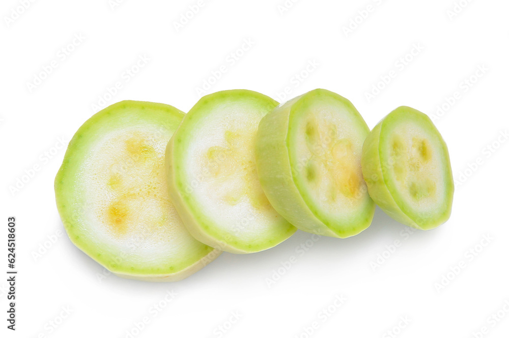 Slices of fresh green zucchini on white background