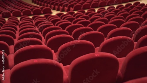 Red chairs of the empty theater photo