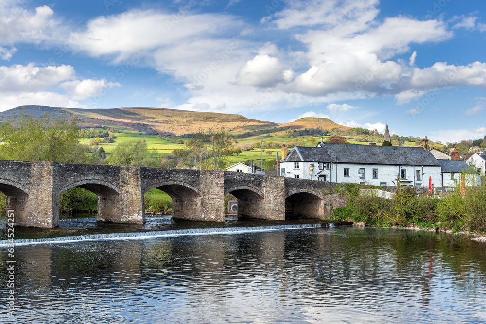 The Crickhowell Bridge, an 18th century arched stone bridge spanning the river Usk in Crickhowell, Brecon Beacons, Powys, Wales, the longest stone bridge in Wales.	