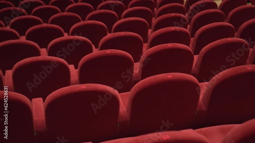 Red chairs of the empty theater