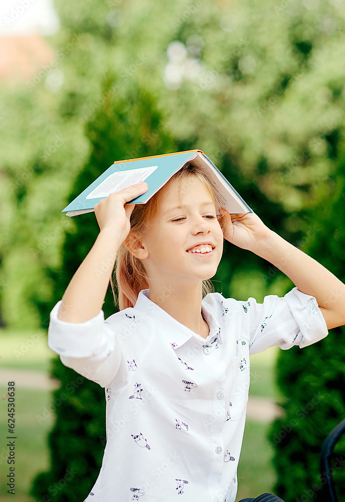 Back to school! Happy cute industrious child. Concept of education and reading. The development of the imagination