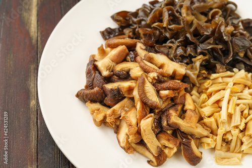 Various dried mountain delicacies on a monochrome background