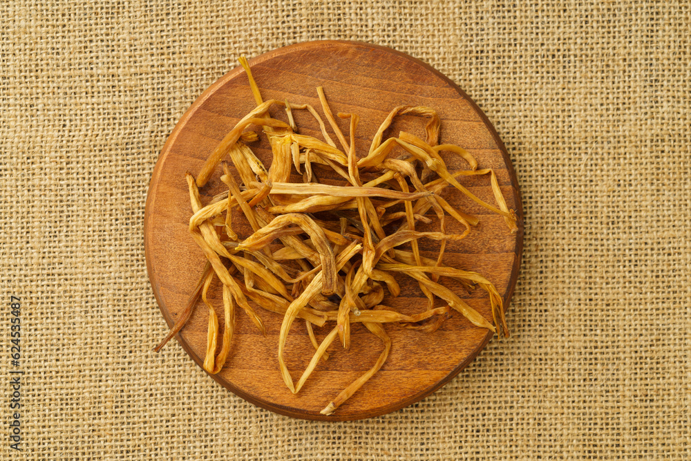 Dried daylily on a monochrome background Dried daylily on a monochrome background