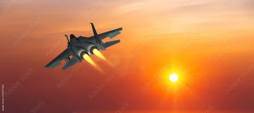 Military aircraft flying on a sunset sky background