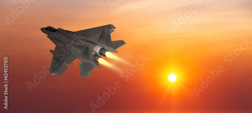 Military aircraft flying on a sunset sky background