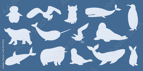 Vector set of silhouettes of polar animals, marine mammals and birds. Whale, narwhal, walrus, polar owl, polar bear, penguins. Vector illustration in flat style. Banner, poster. Isolated objects. 