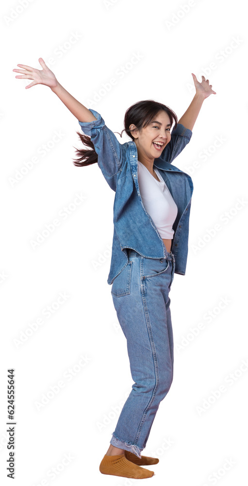 Elegant young Asian woman raises her arm and leg in a studio shot, expressing happiness and success isolated background Elegant young Asian woman raises her arm and leg in a studio shot, expressing happiness and success isolated background