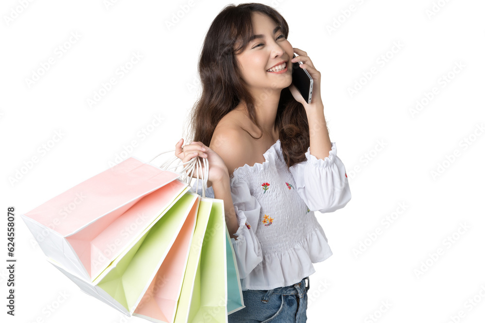 Young Asian woman usin shopping bag using phone on isolate background Young Asian woman usin shopping bag using phone on isolate background