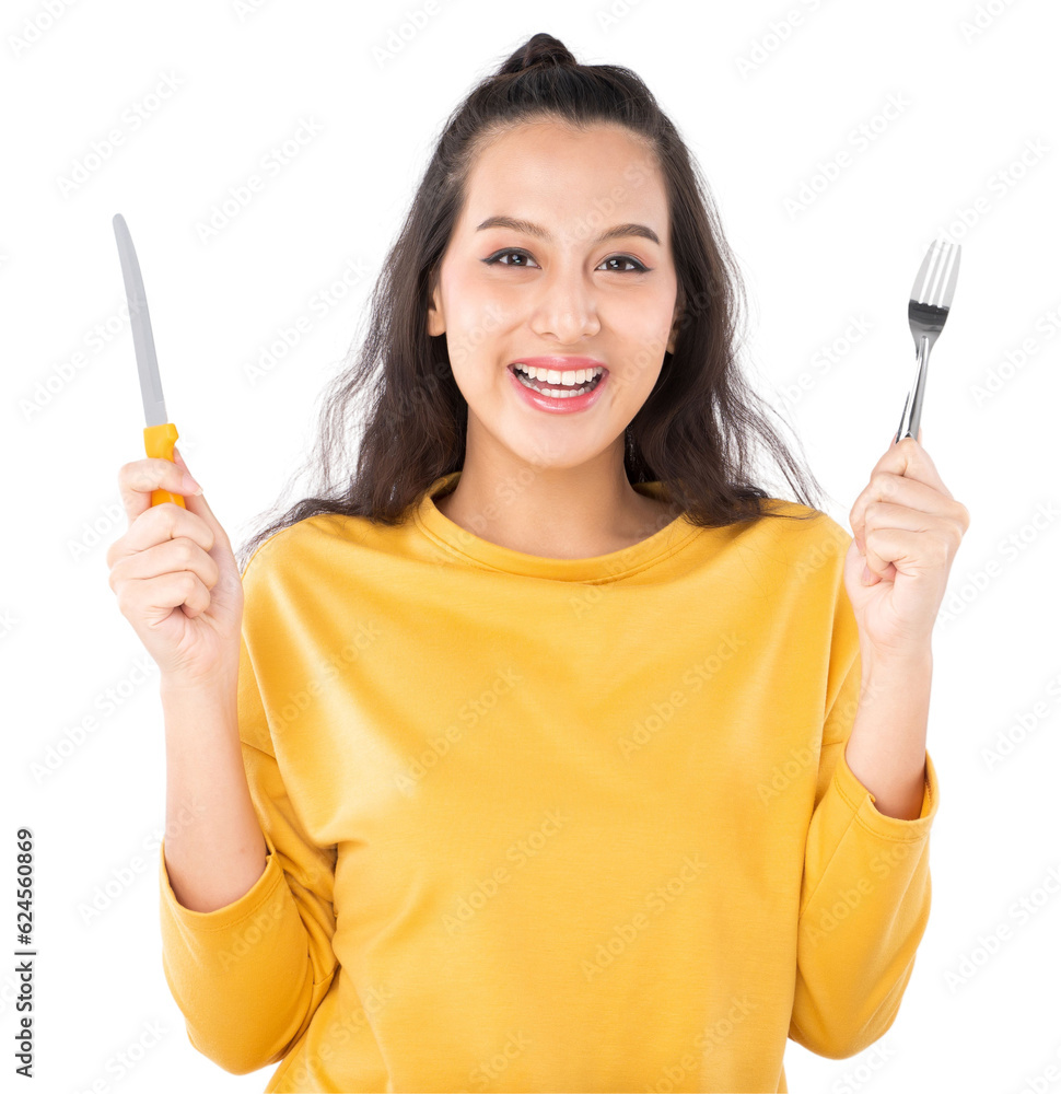 Young beauty Asian woman showing Knife Fork prepare to eat food and she wearing a yellow sweater shot isolated on white background Young beauty Asian woman showing Knife Fork prepare to eat food and she wearing a yellow sweater shot isolated on white background