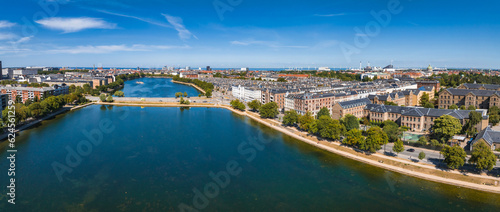 Aerial view of the Copenhagen in Denmark. Central historical part of the city, city roofs and Copenhagen lakes.