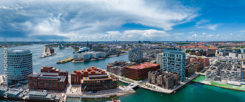 Aerial panorama of Indre Osterbro  Nordhavnen districts. New modern district in Copenhagen  Denmark. Beautiful modern buildings  Portland Towers and UN.