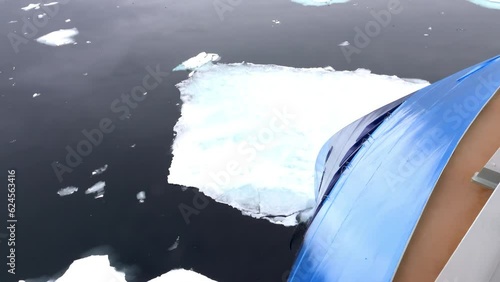Prow Ship breaks ice in the sea of Norway, North pole
Global warming concept, North Pole, 2023
 photo