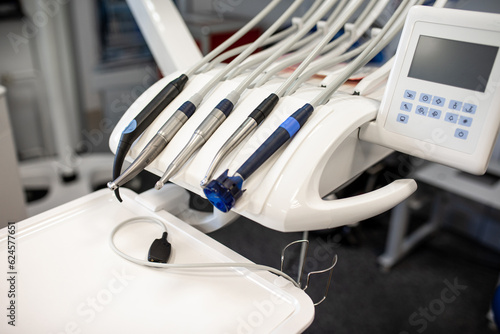 Different stomatological instruments using for teeth treatment  drilling and cleaning in modern dentistry clinic.