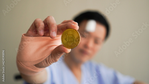 Injured Asian man admit in hospital invest in cryto currency