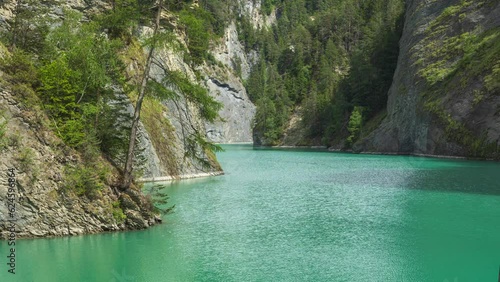 Time Lapse, Mountain lake reservoir in the Swiss Alps. Solis reservoir, Stausee Solis, Albula river, Canton of Graubünden, Switzerland. photo