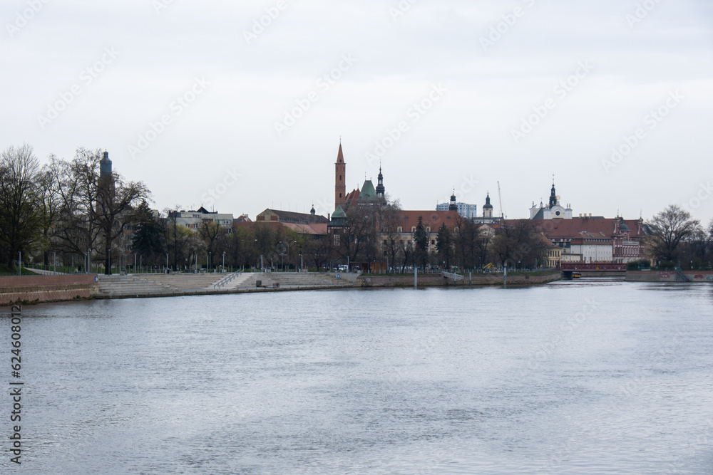 Fototapeta premium Wroclaw landscape panorama. Odra river Historical capital of Silesia, Europe. City hall architecture buildings. Old town landmark cathedrals church. Travel tourist destination 