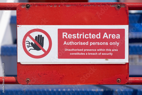 Wallpaper Mural Warning Sign on a gate. Red and white restricted area sign, authorized persons only, with hand icon, on the deck of a ferry Torontodigital.ca