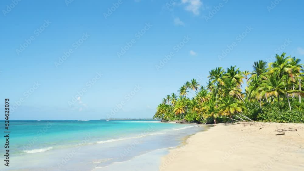 Travel to a tropical paradise island in the ocean. Idyllic sea beach, palm trees, white sand and crystal clear water. Amazing wildlife scenery of Thailand. Wave on the sand. Relaxation at sea. Travel to a tropical paradise island in the ocean. Idyllic sea beach, palm trees, white sand and crystal clear water. Amazing wildlife scenery of Thailand. Wave on the sand. Relaxation at sea.