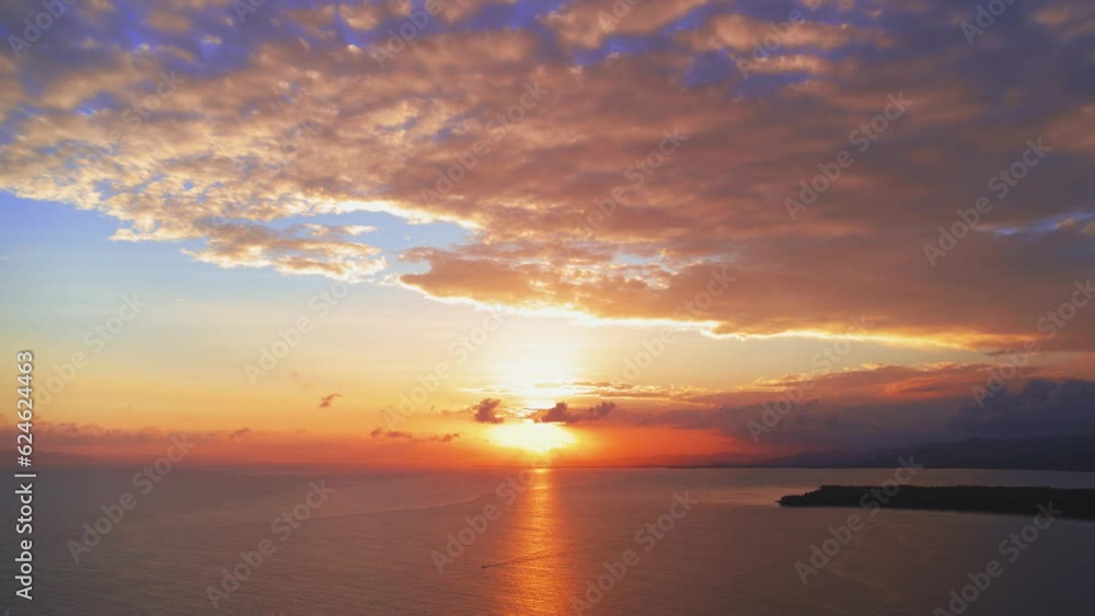 Beautiful gentle orange sunset over calm sea, beautiful natural background. The golden sun rises over the Caribbean Sea, bathing the calm waters in warm light. Twilight over the sea. Beautiful gentle orange sunset over calm sea, beautiful natural background. The golden sun rises over the Caribbean Sea, bathing the calm waters in warm light. Twilight over the sea.