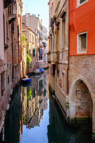 Venice  Italy - June 22  2023  Canal  bridge and ancient houses of Venice
