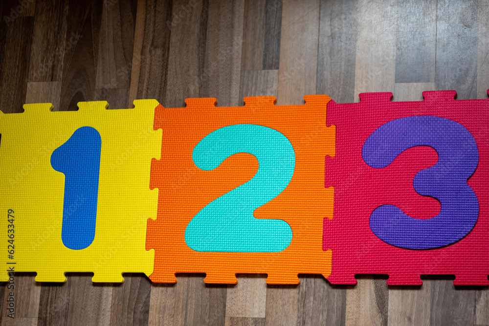 a mat puzzle with the numbers one two and three a mat puzzle with the numbers one two and three