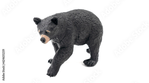 Figure of a plastic toy grizzly bear, isolate on a white background