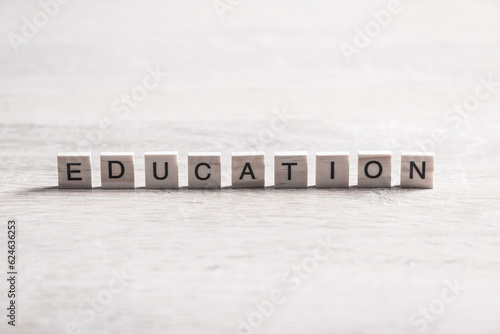 wooden elements with the letters collected in the word education