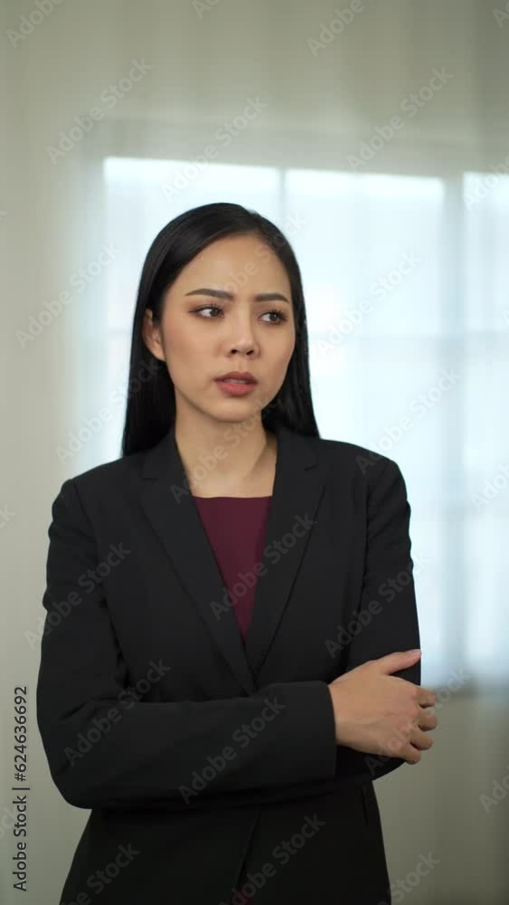 Vertical shots portrait of unhappy business woman wearing black suit stressed suffering from headache by mobile video call chat application or social media. Webcam view, vertical video concept.
Vertical shots portrait of unhappy business woman wearing black suit stressed suffering from headache by mobile video call chat application or social media. Webcam view, vertical video concept.