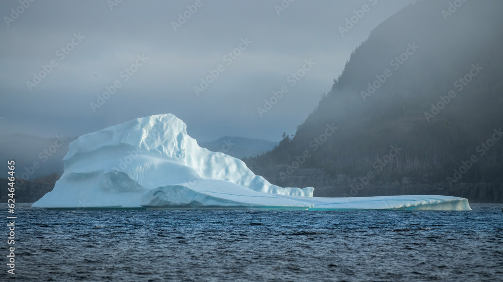 Iceberg in calm waters Iceberg in calm waters