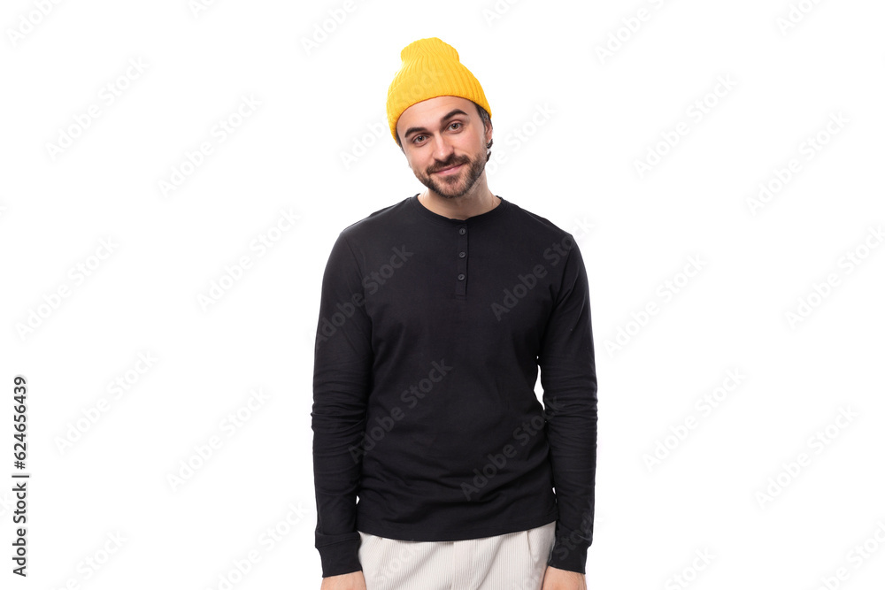 young masculine brunette caucasian male model with beard dressed casually on white background with copy space young masculine brunette caucasian male model with beard dressed casually on white background with copy space