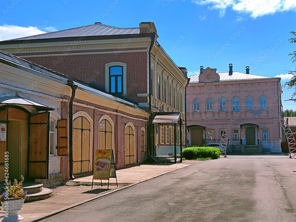 Kozmodemyansk, Republic of Mari El, Russia - 08.28.2021. Historical buildings near Gorbuntsov Park
