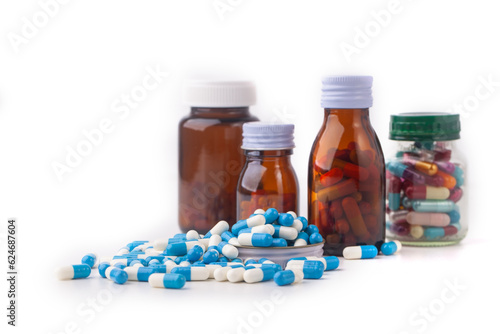 tablet of pills and syrup medicine on white background with copy space, health care and medical concept background, edit tone