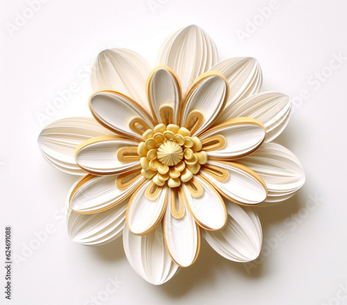 Fotografering there is a white and gold flower brooch on a white surface
