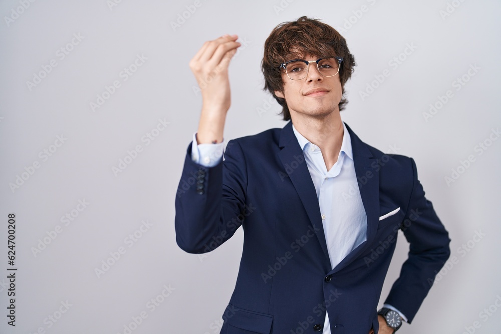 Hispanic business young man wearing glasses doing italian gesture with hand and fingers confident expression Hispanic business young man wearing glasses doing italian gesture with hand and fingers confident expression