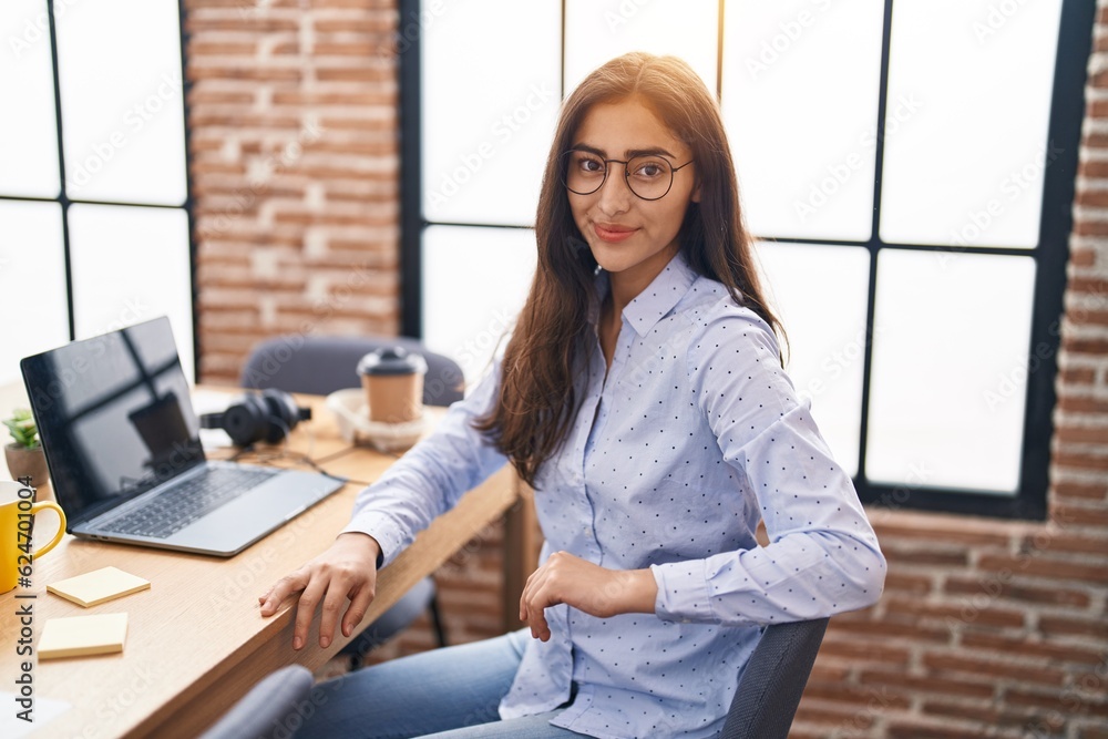 Young hispanic girl business worker using laptop working at office Young hispanic girl business worker using laptop working at office